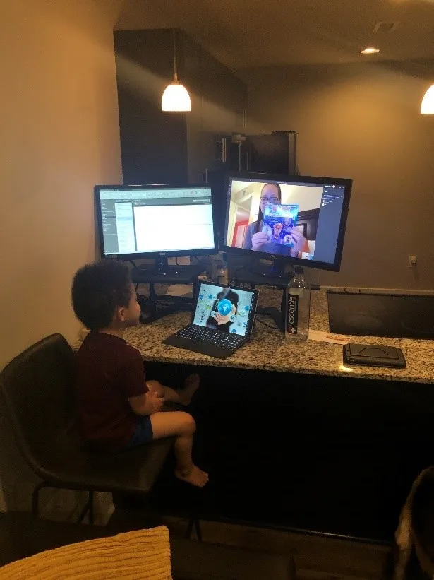 My son and his mother using Teams to read “Blippi: Let’s See Animals!” by Stevin John